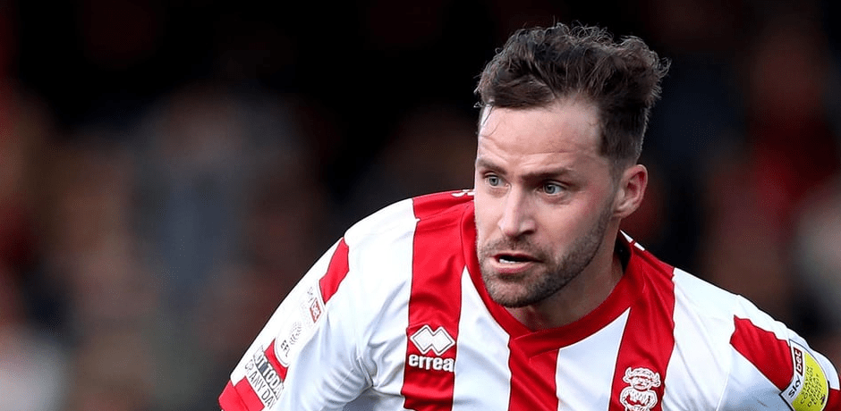 Chris Maguire, a forward for Lincoln City, has been punished for allegedly breaking betting rules.